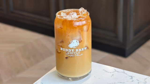Glass of a coffee drink in a modern kitchen.