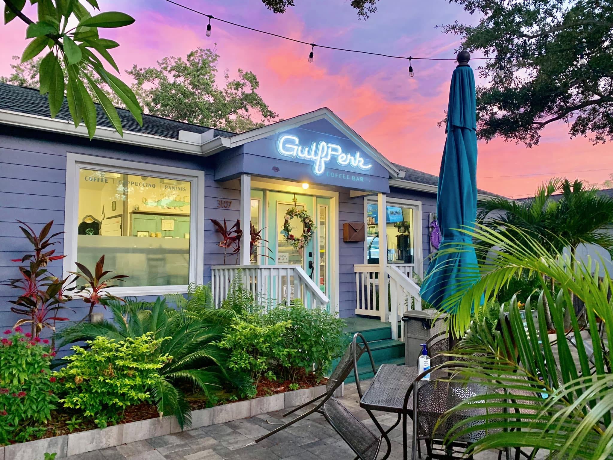 A little blue coffee shop that says Gulfperk Coffee Shop
